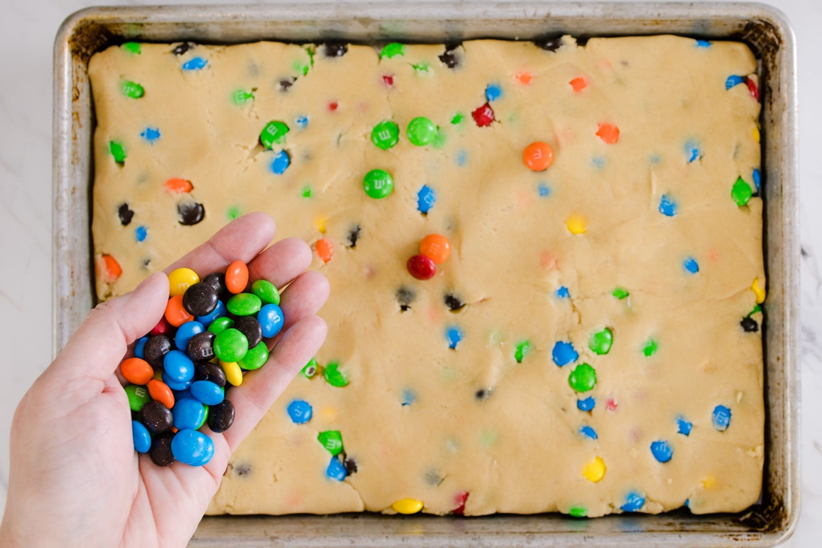Add extra M&M Candies on top before baking