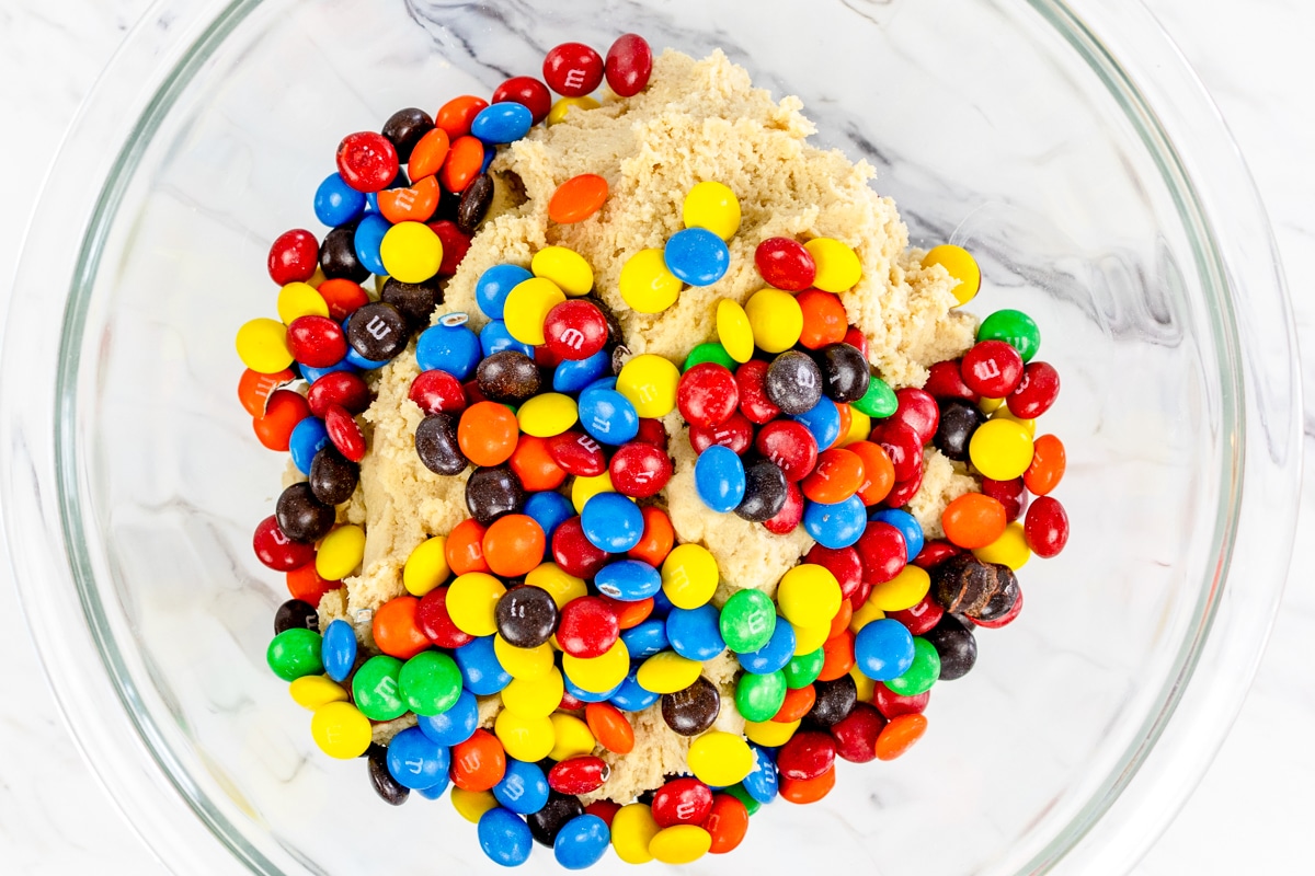 Mix cookie dough with M&Ms