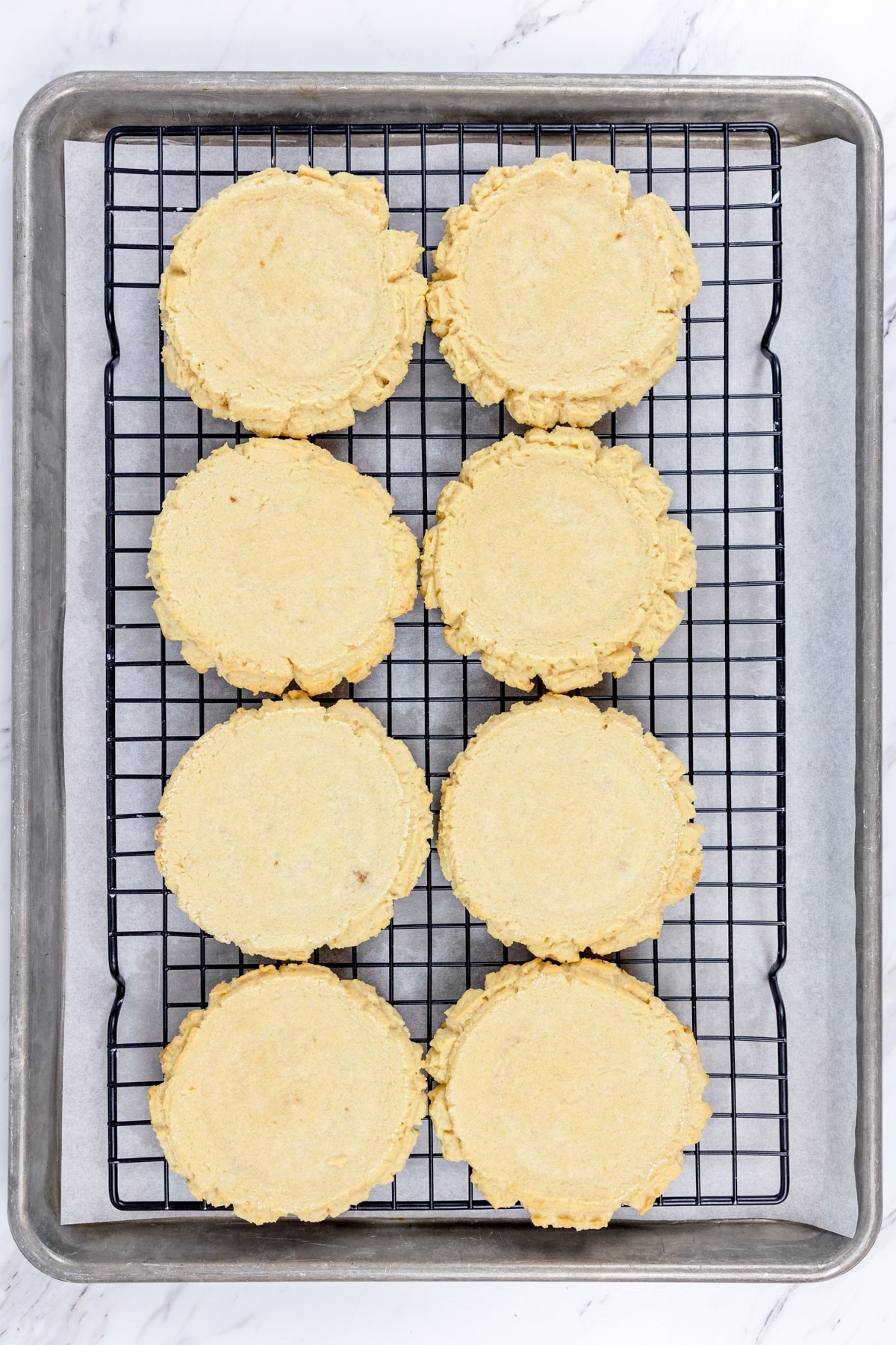 Top view of cookies on a wire cooling rack. 