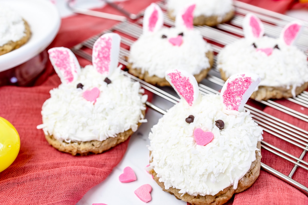 Close up of Easter bunny cookies on a wire rack. 