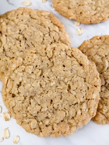 Close up of Oatmeal Coconut Cookies in a pile.