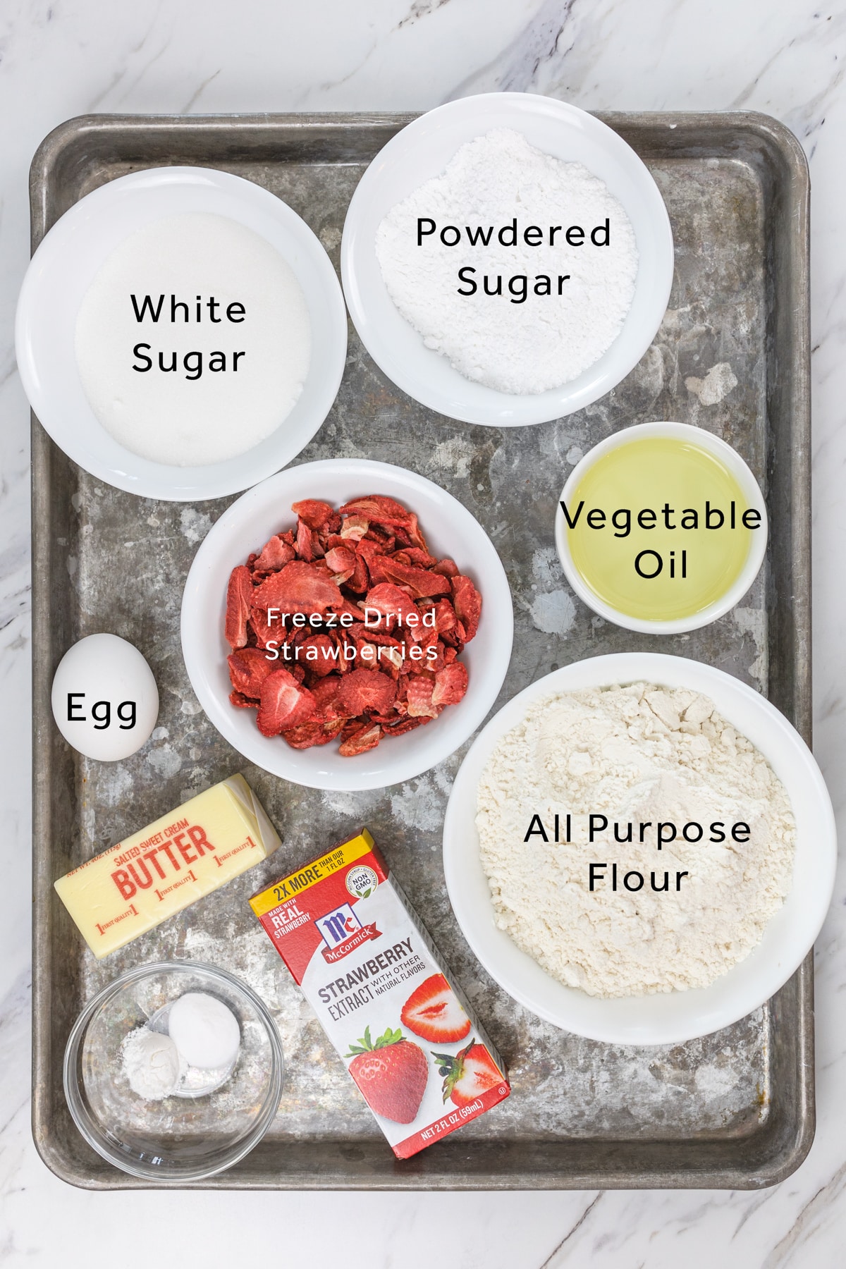 Top view of ingredients needed to make strawberry sugar cookies.