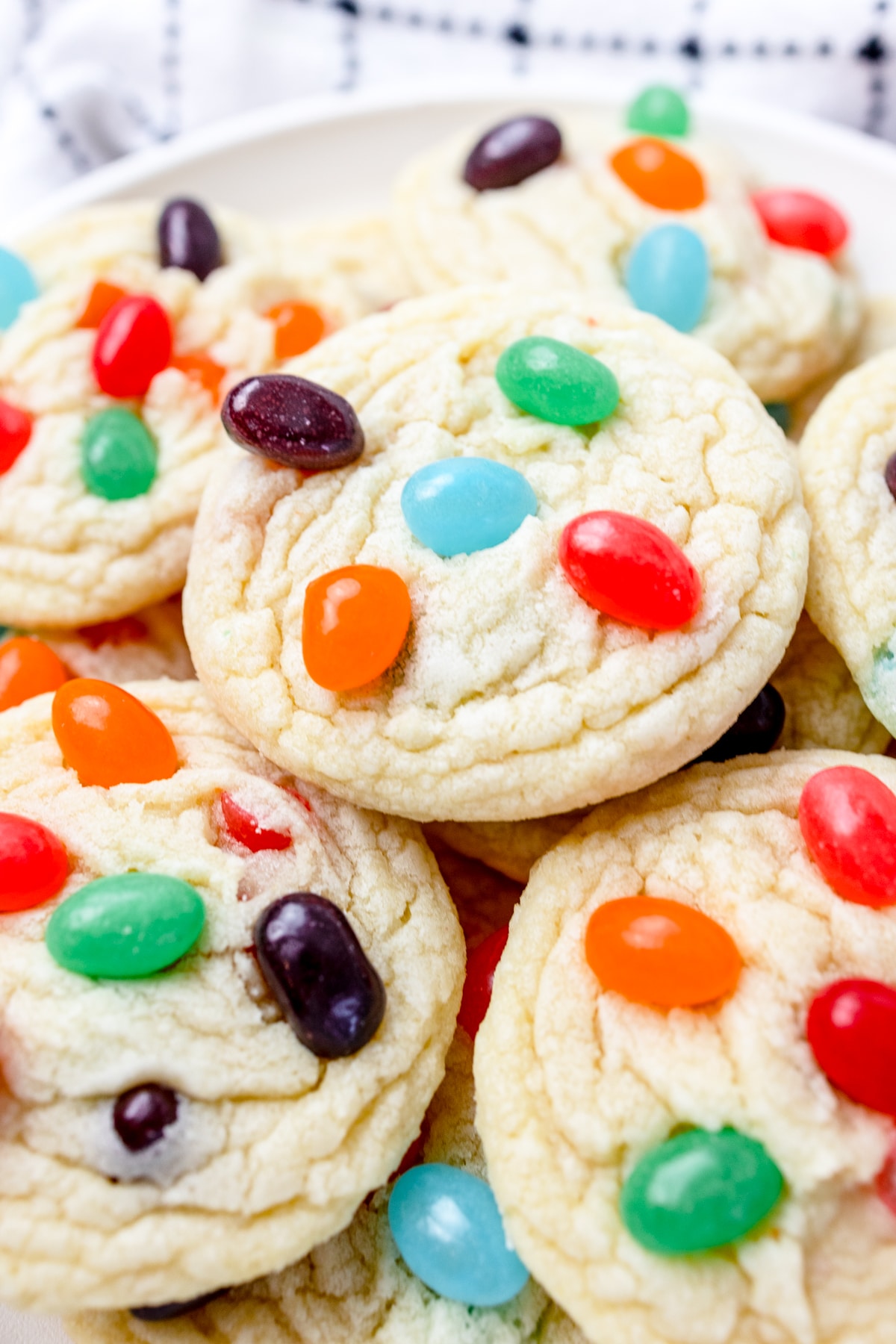 Close up of Jelly Bean Cookies in a pile on a plate. 