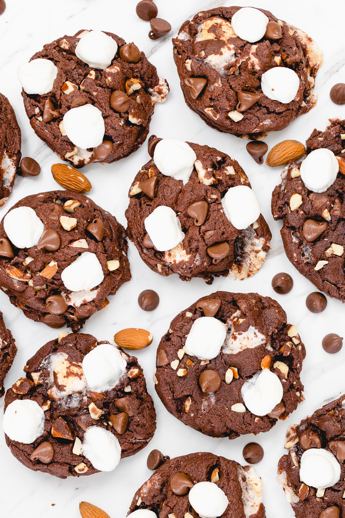 Top view of rocky road cookies on parchment paper. 