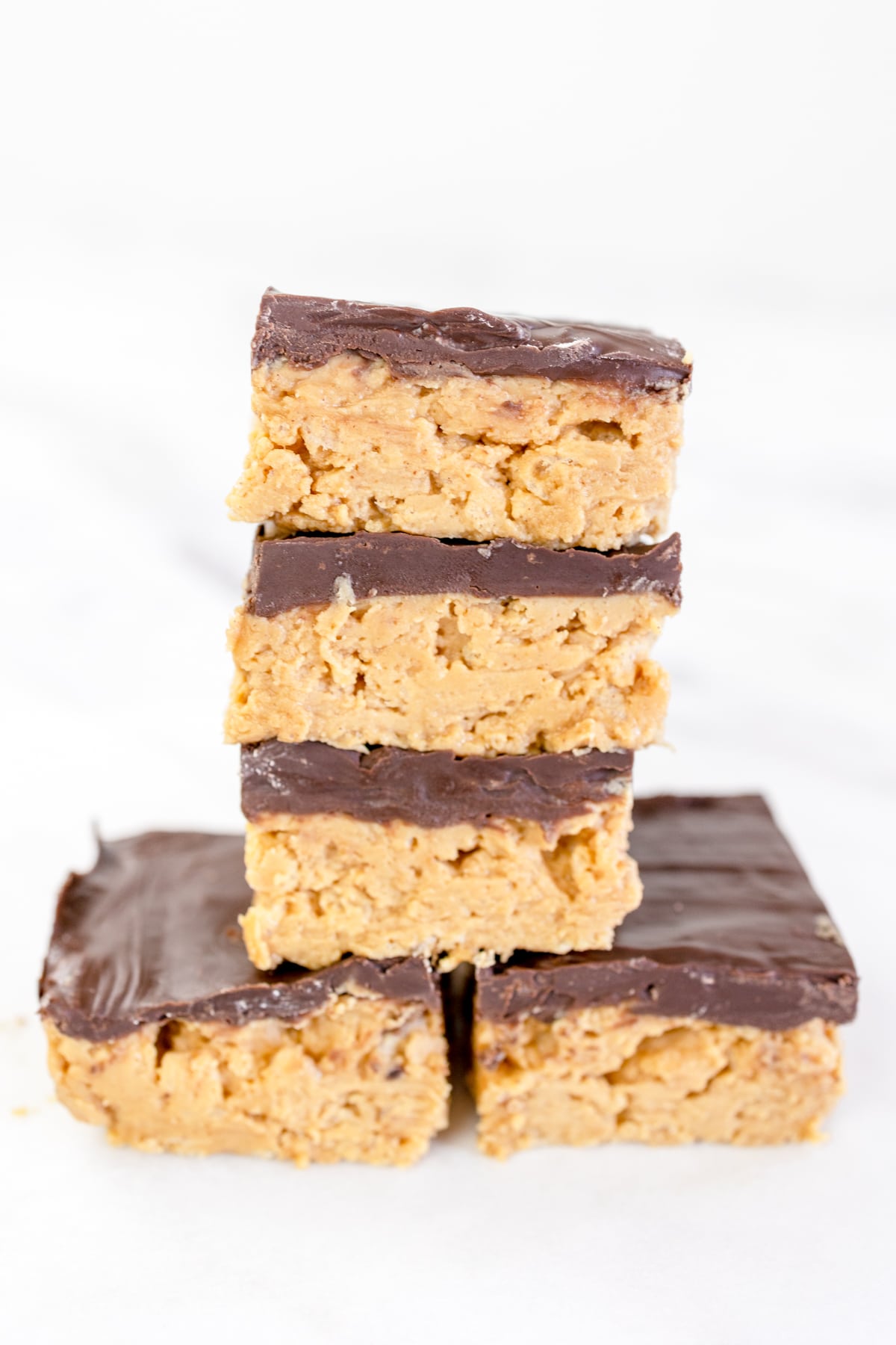 Stack of Buckeye Bars on a white surface. 