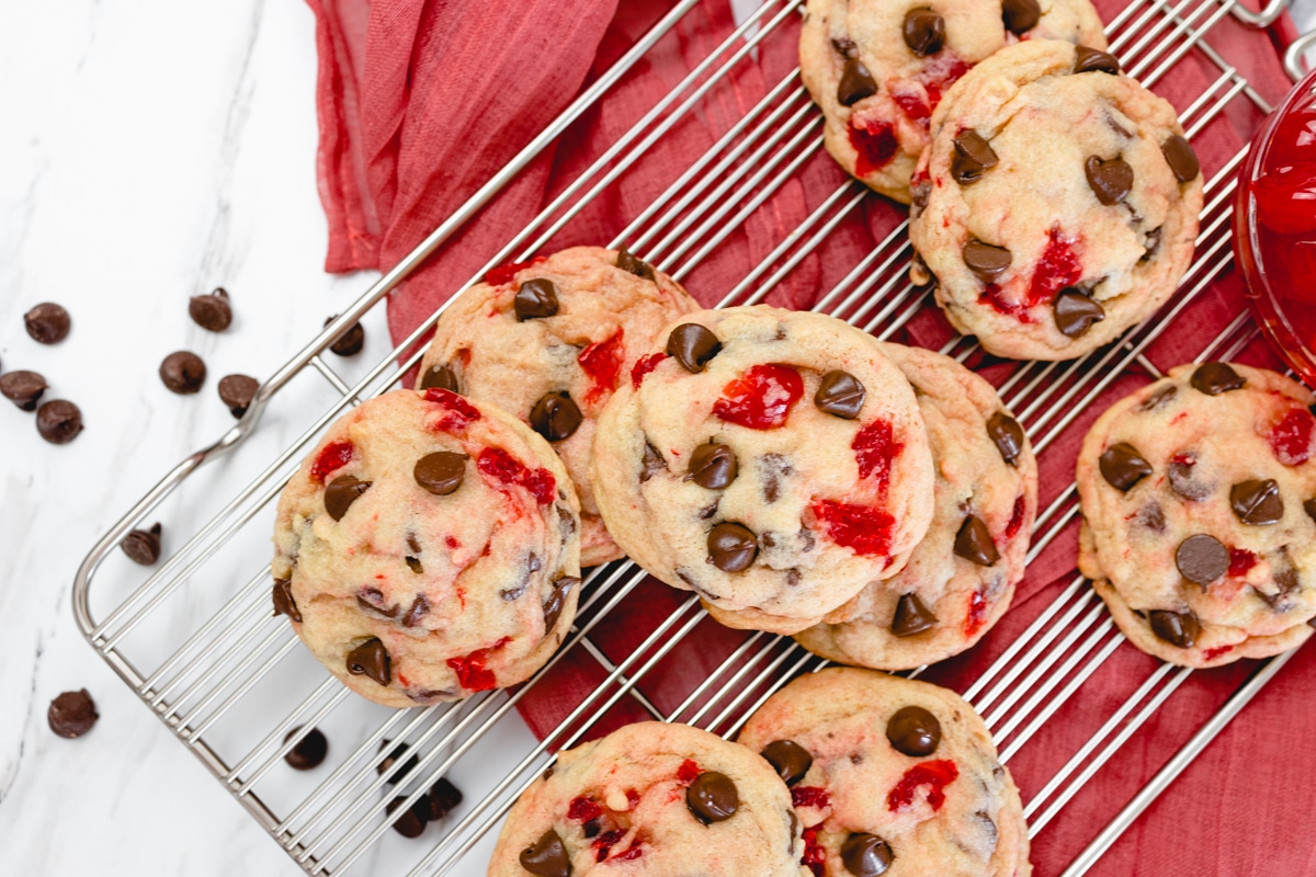 Top view of a pile of cherry chocolate chip cookies.