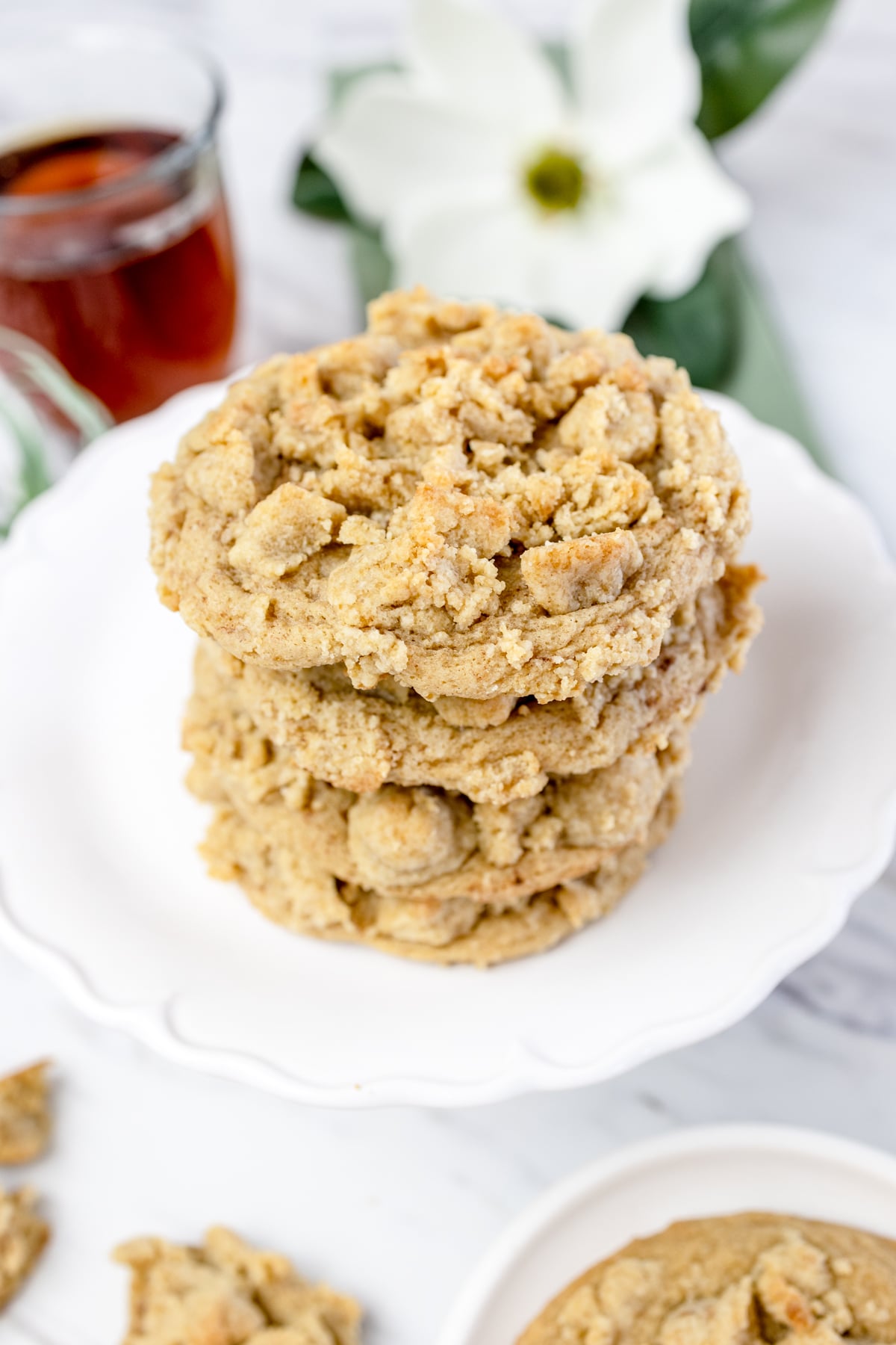 A stack of Coffee Cake Cookies on a white plate.