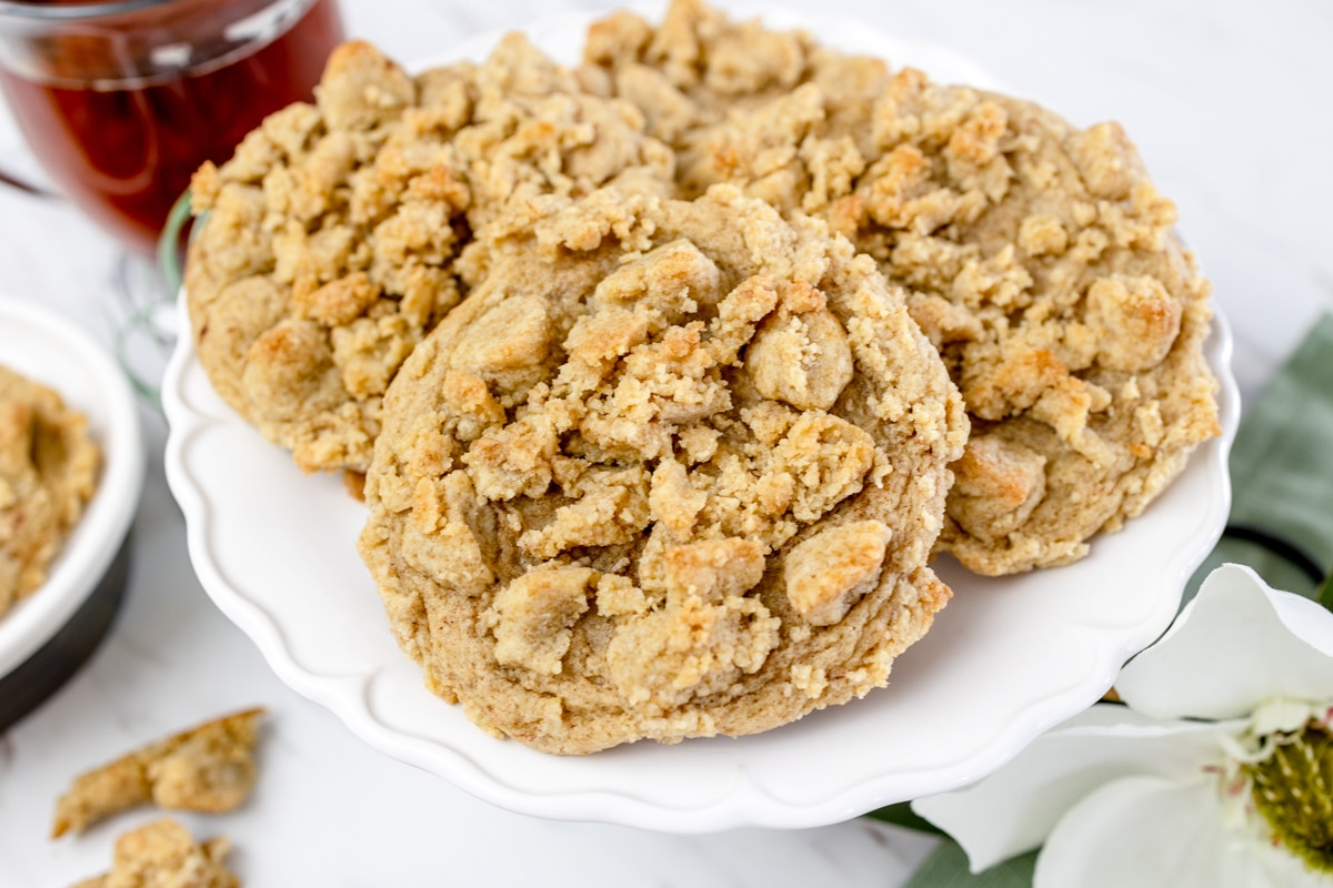 A pile of Coffee Cake Cookies on a white plate.