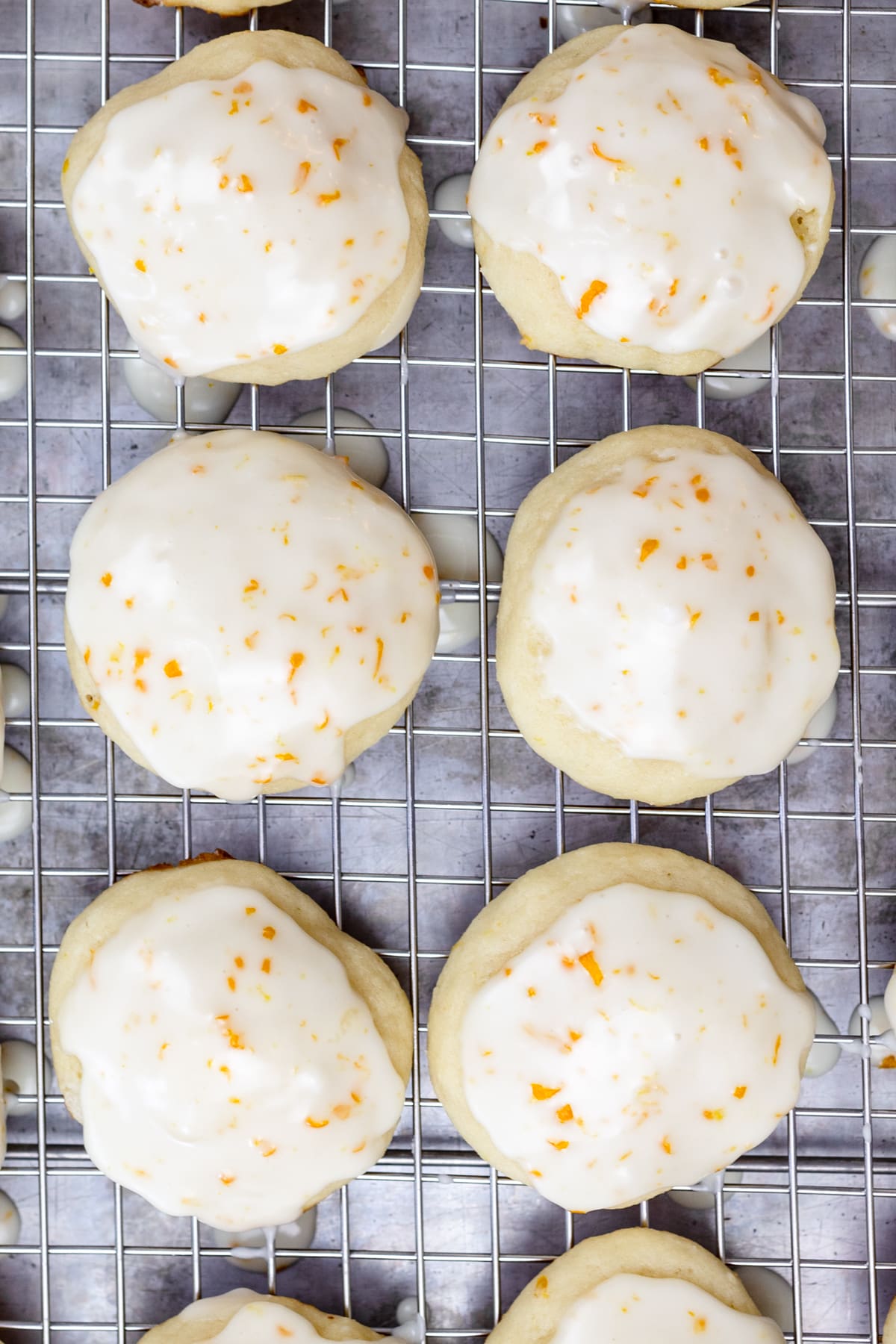 Top view of lemon ricotta cookies on a wire rack.
