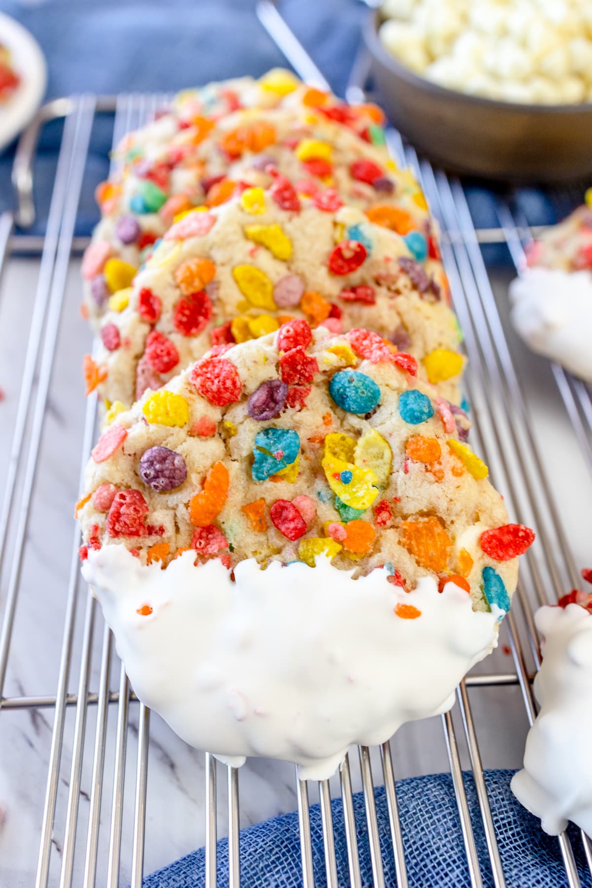 Close up of Fruity Pebbles Cookies on a wire rack.