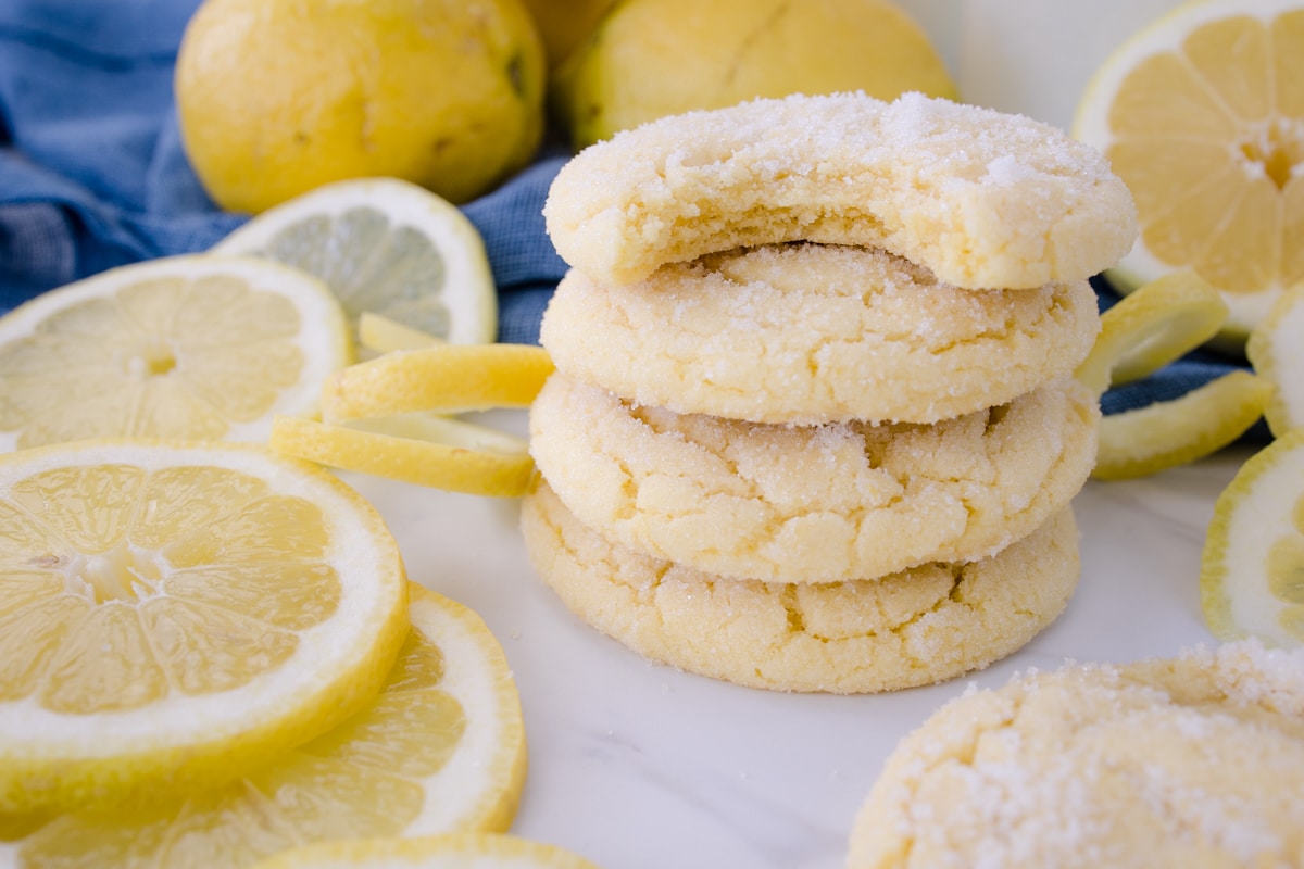Close up of a stack of lemon sugar cookies.