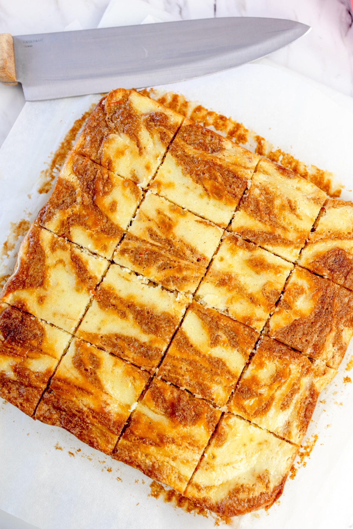 Cutting Carrot Cake Bars with knife