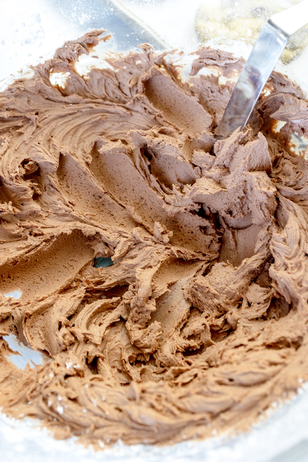 Close up of chocolate frosting whipped.