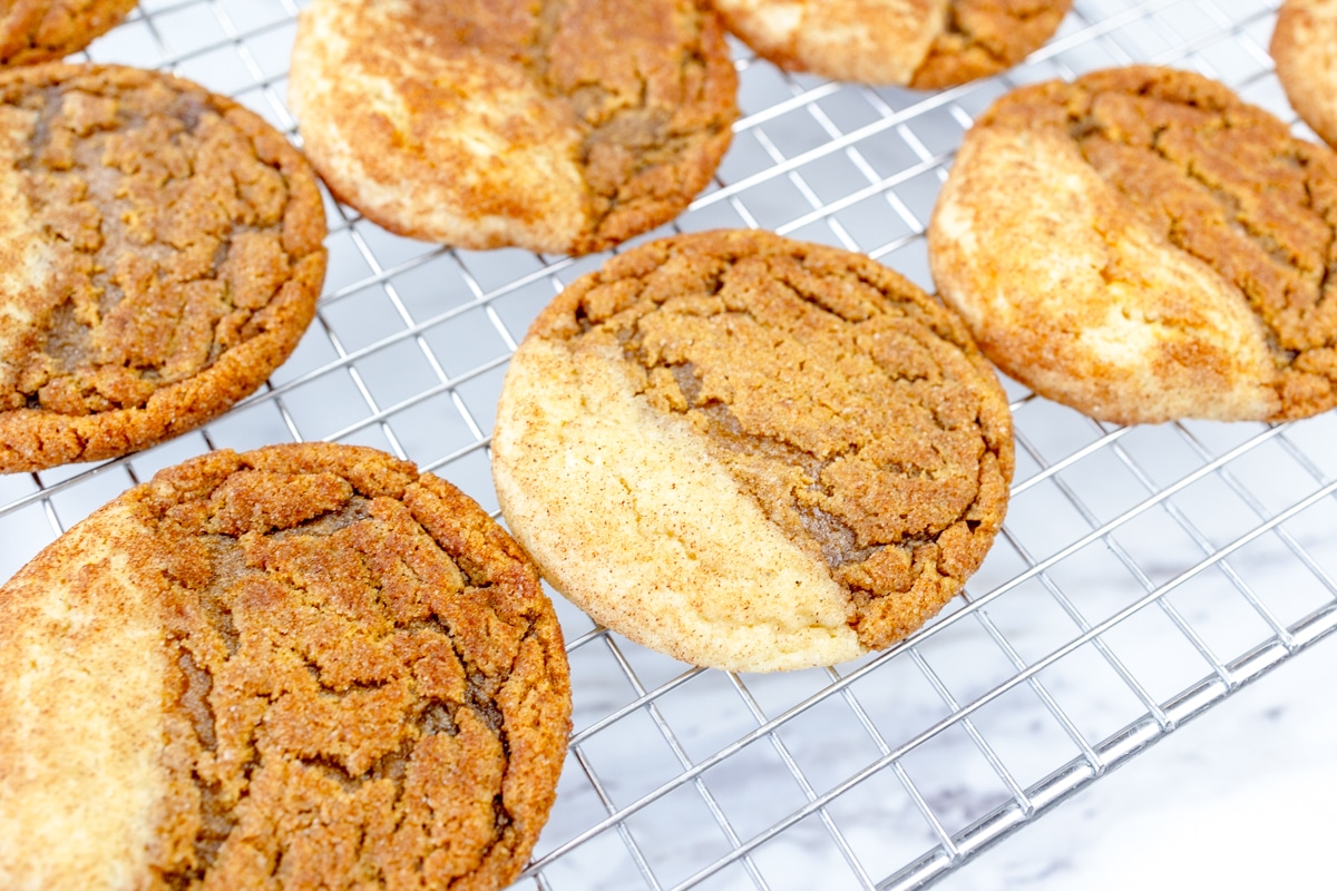 Close up of freshly baked gingerdoodle cookies on a wire rack.