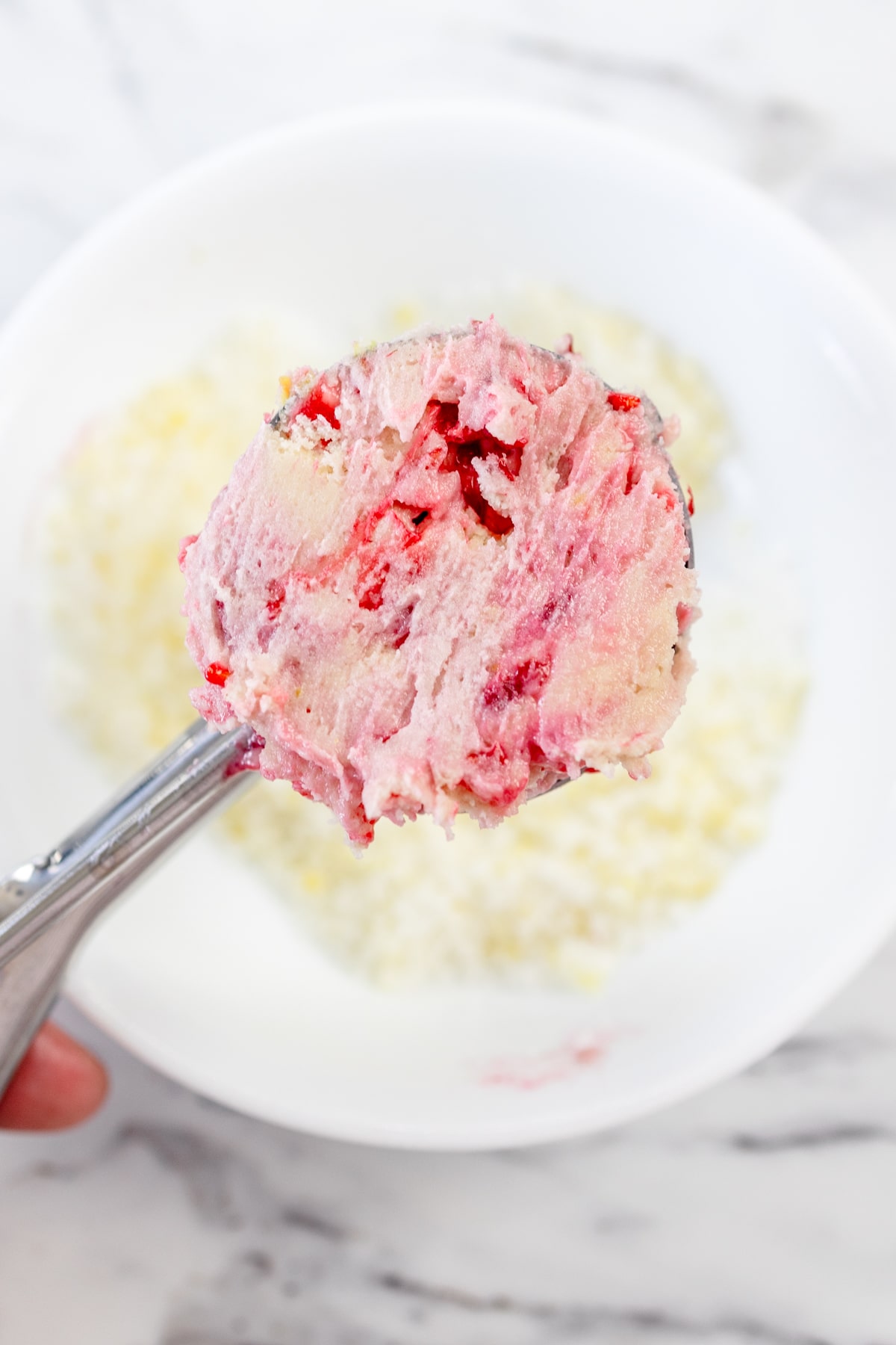 Lemon Raspberry Cookie dough in cookie scoop