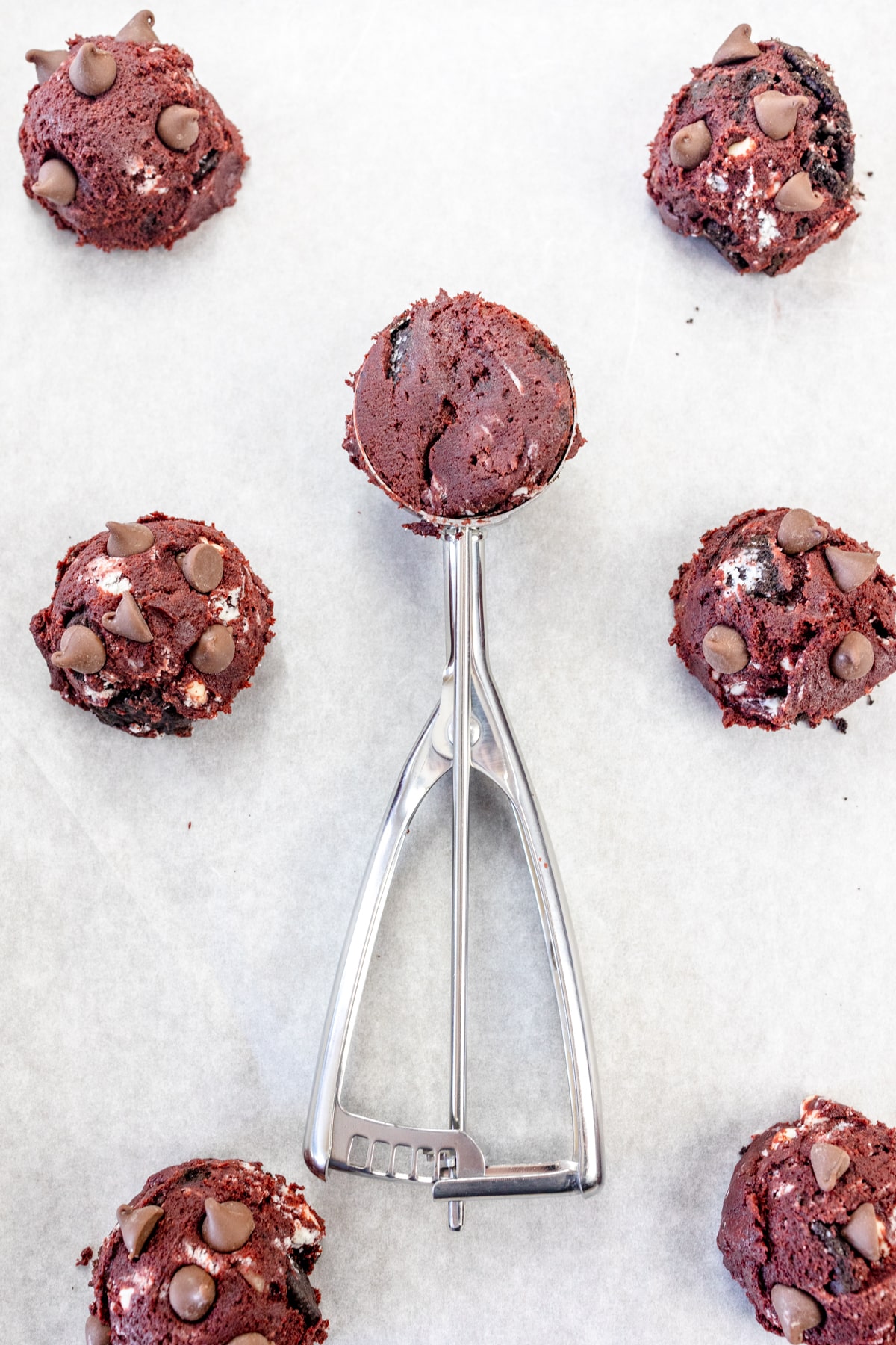 Scoop Cookie dough with a cookie scoop and place on baking sheet