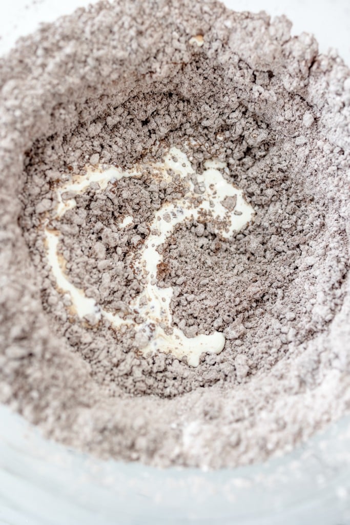 Top view close up of a chocolate mixture in a mixing bowl.