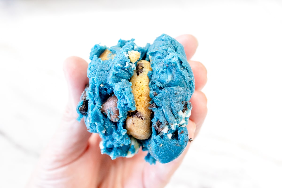 Top view close up of a Cookie Monster Cookie dough sandwich.