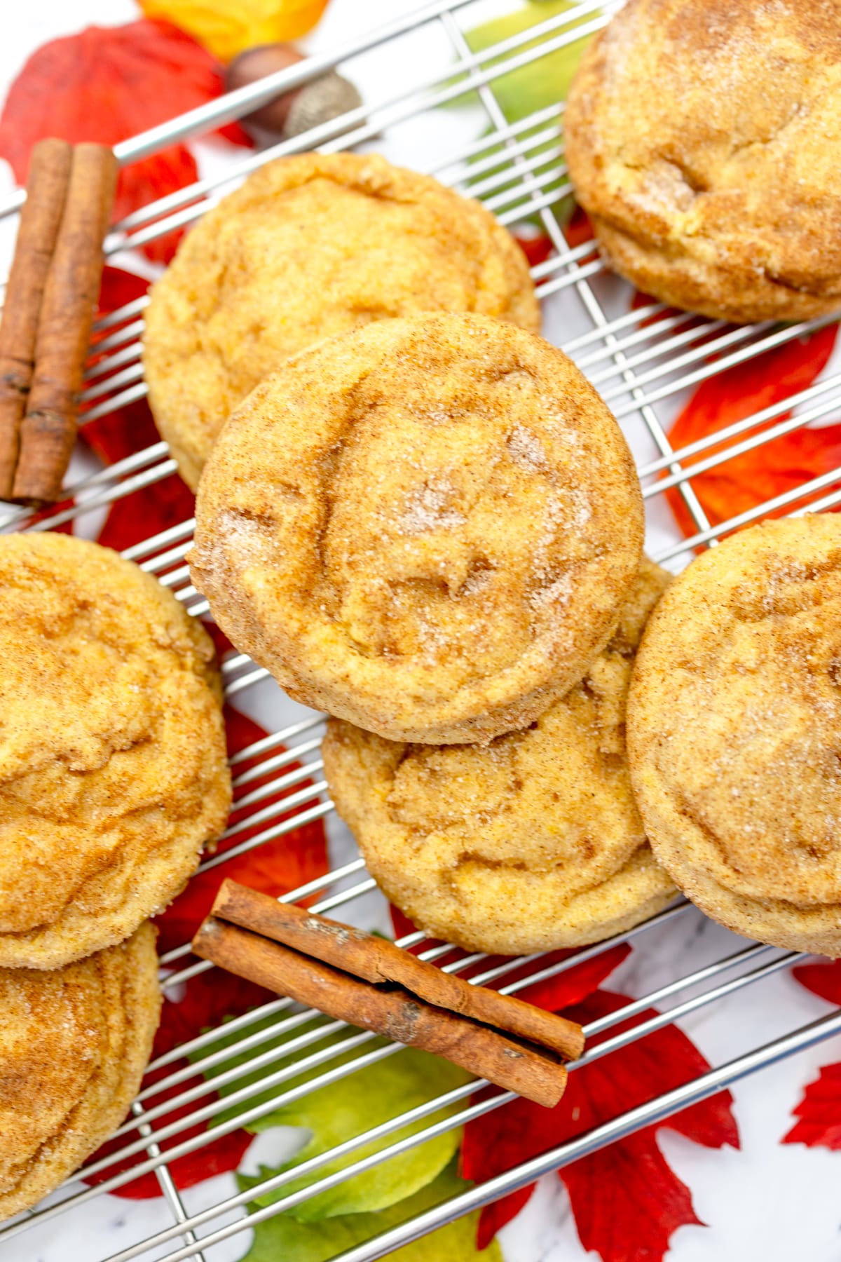 Top view of Pumpkin Snickerdoodle Cookies on a wire rack. 