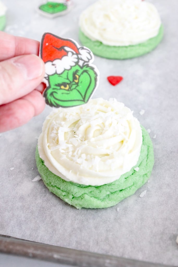 Add Grinch Sugar Candy to frosted cookie
