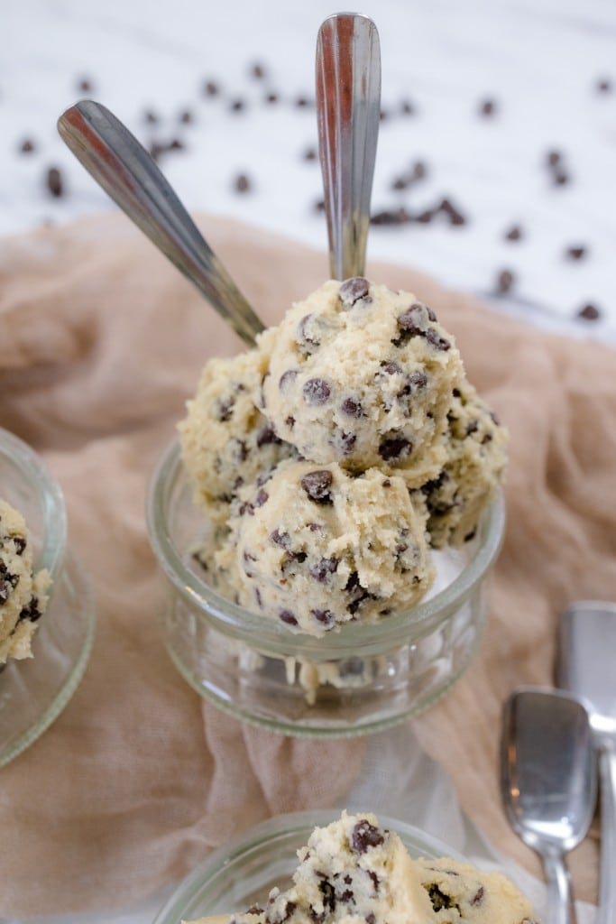 Edible Cookie dough in glass bowl with spoons