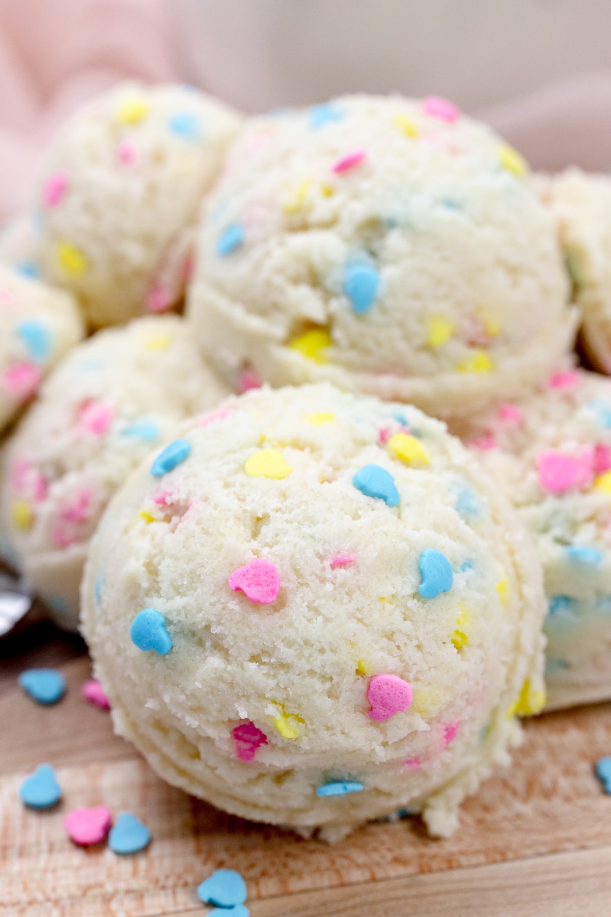 Close up view of scoops of edible sugar cookie dough.