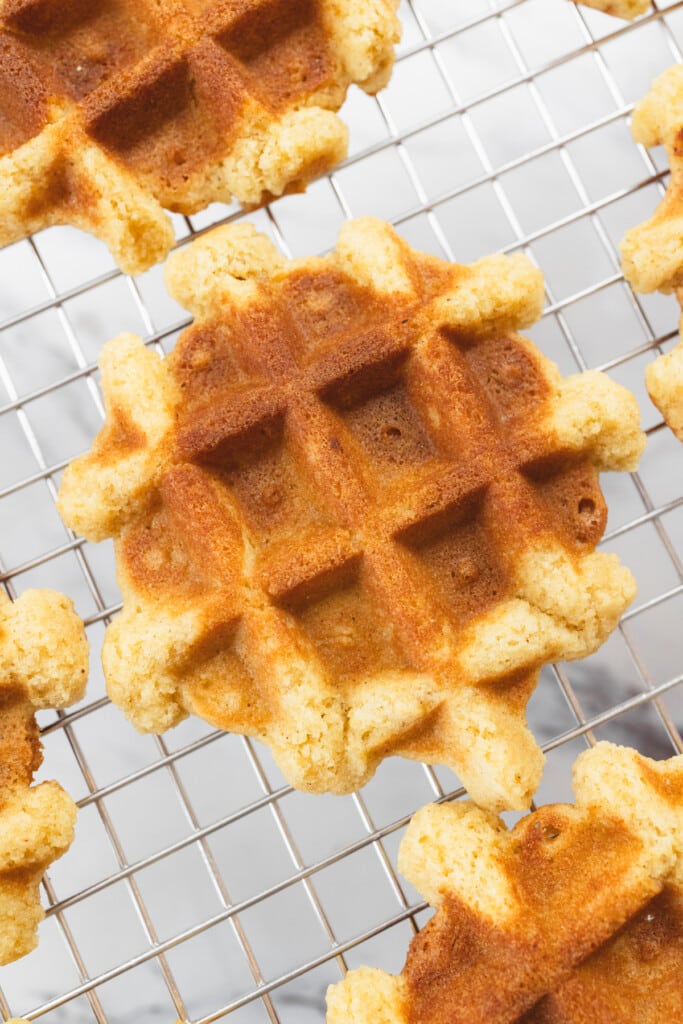 Top view close up of a waffle cookie on a wire rack.